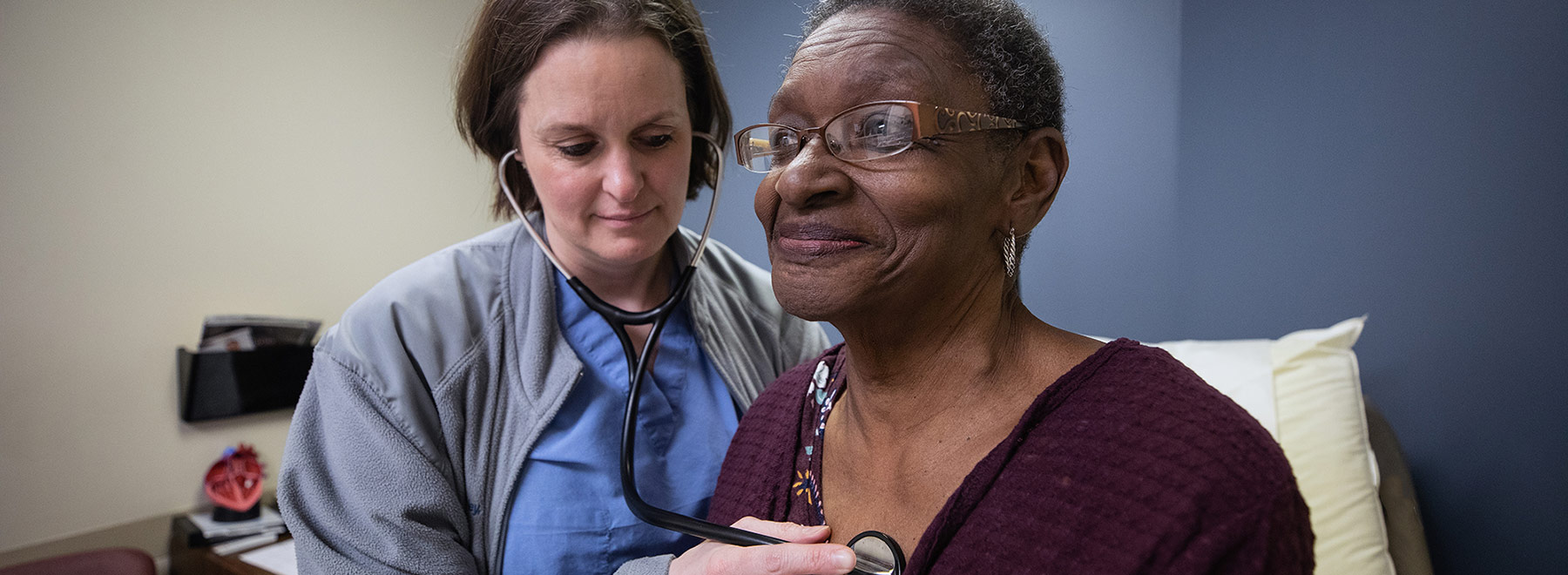 Cardiologist examining a Mitraclip patient